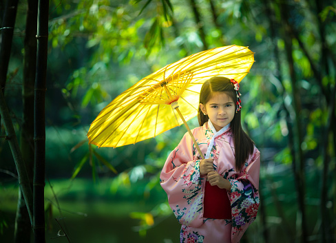 Girl with japanese heritage wearing kimono