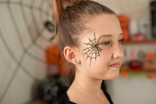 Girl With Spider Web Face Painting Stock Photo - Download Image