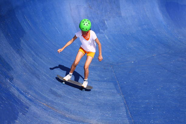 Girl with the green helmet stock photo