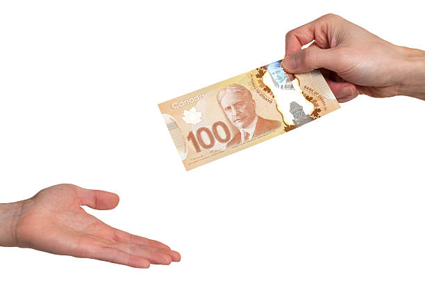250 Giving Canadian Money Stock Photos, Pictures &amp; Royalty-Free Images -  iStock
