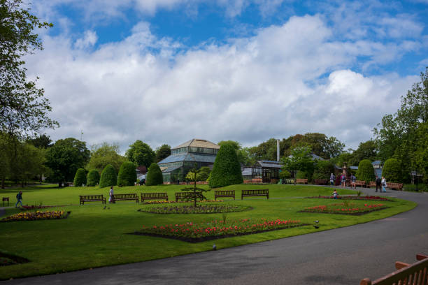 Glasgow Botanic Gardens, a botanical garden located in the West End, features several glasshouses, the most notable of which is the Kibble Palace stock photo