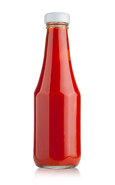 Glass bottle of ketchup Glass bottle of ketchup on white background with clipping path ketchup stock pictures, royalty-free photos & images