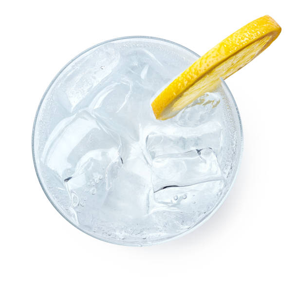Glass of Gin and tonic Glass of Gin and tonic with slice of lemon isolated on white background. Top view vodka soda stock pictures, royalty-free photos & images