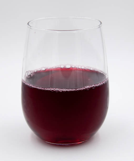 Glass of grape juice stock photo