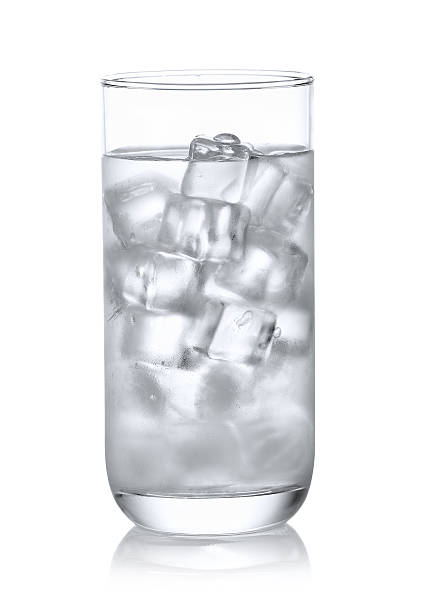 glass of water with ice on white  background. stock photo