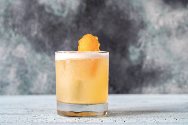 Glass of whiskey sour stock photo