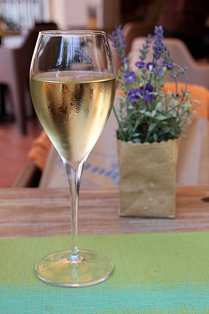 Glass of white wine stock photo