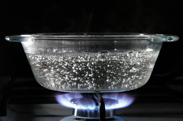 Glass saucepan stock photo