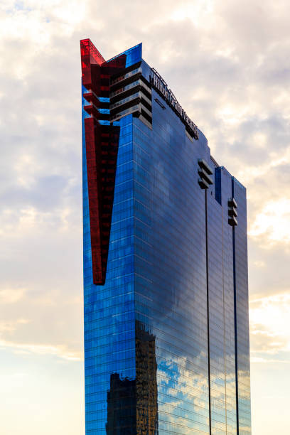 Glass Tower LAS VEGAS - JUL 8, 2015: Hilton Grand Vacations Suites on the Strip Boulevard. This elegant resort combines the comforts of a luxurious home with ideal access to the city's signature attractions.  About 40 million people visiting the city each year. mall of america stock pictures, royalty-free photos & images