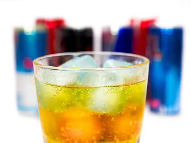 glass with ice and energy drinks on the background stock photo