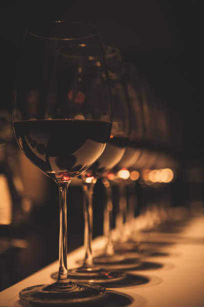 Glasses of Red Wine in Wine Tasting Room stock photo