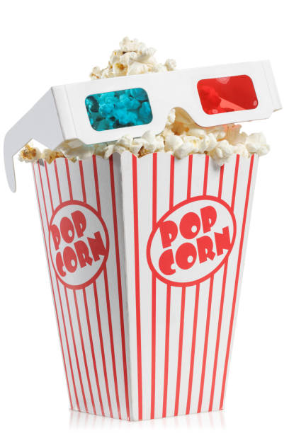3D glasses on top of a popcorn box 3D glasses on top of a popcorn box isolated on white background 3 d glasses stock pictures, royalty-free photos & images