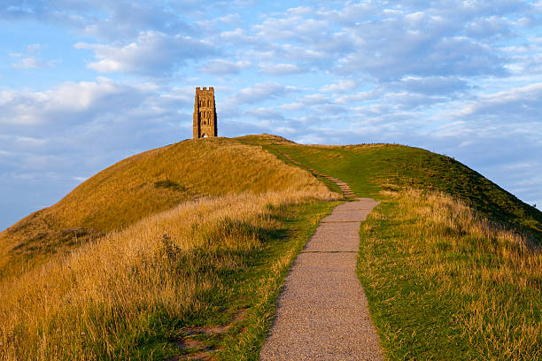 Glastonbury Gate The historic Glastonbury Tor in Somerset, England. outcrop stock pictures, royalty-free photos & images