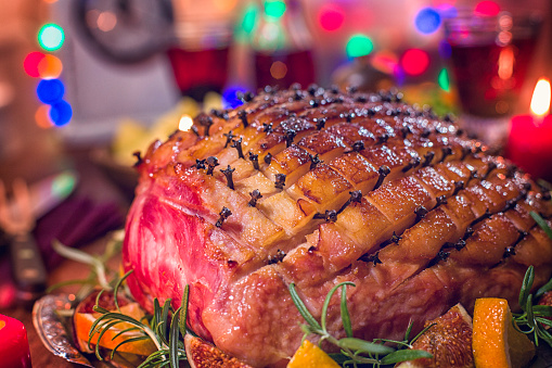 Glazed Holiday Ham With Cloves Served For Dinner Stock Photo - Download ...