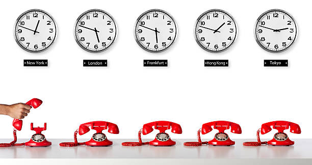 Global Communication This is a photo of 5 red telephones sitting below five clocks with different time zones around the world. The background is a pure white allowing for the end user to add more copy space between the clocks and the phones if needed.There are similar images in the telephone lightbox below. how do you say shut up in japanese stock pictures, royalty-free photos & images
