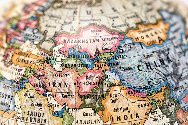 Globe Central Asia Close-up of Afghanistan in the colorful world map. central asia stock pictures, royalty-free photos & images