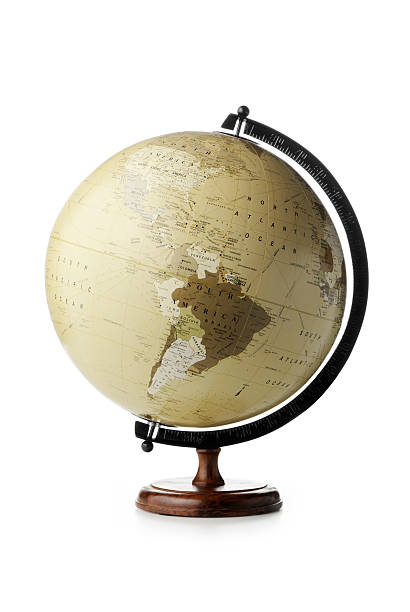 Globe "Vintage look desktop globe showing the Americas, isolated on white. Other picture with the same globe..." globe navigational equipment stock pictures, royalty-free photos & images
