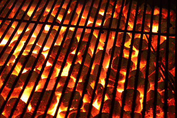 Glowing burning hot barbeque Grill stock photo