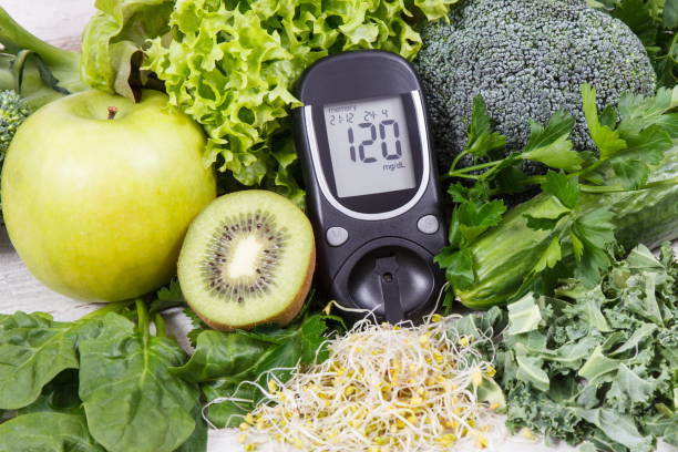 Glucometer for measuring sugar level, fruits and vegetables with sprouts as healthy nutritious food during diabetes Glucometer for measuring sugar level and vegetables with sprouts as healthy nutritious food during diabetes containing vitamins and minerals hyperglycemia stock pictures, royalty-free photos & images