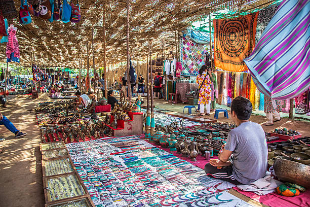 Goa_Market_local Anjuna, India - January 21, 2015: Various things for sale under a sun roof at a local flea market in Goa, India flea market photos stock pictures, royalty-free photos & images