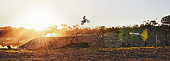 Shot of a motocross rider going over a jump during a racehttp://195.154.178.81/DATA/i_collage/pi/shoots/783228.jpg