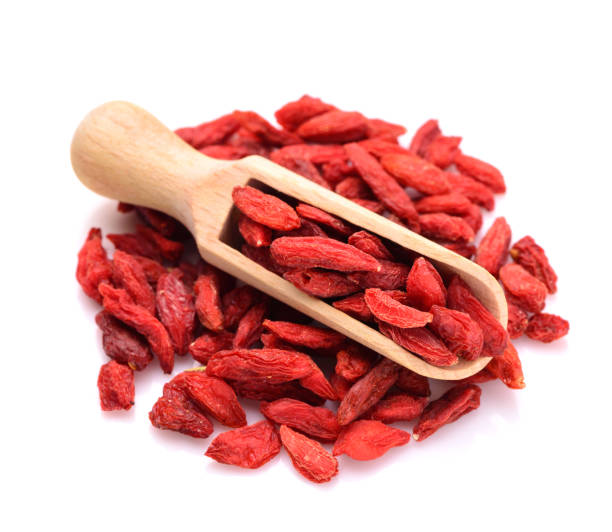 goji berries in a scoop for spices stock photo