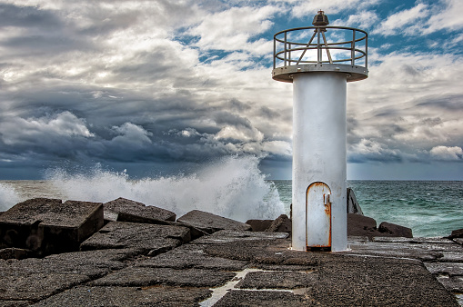 Lighthouse on the Breakwater in the Gold Coast on a stormy day