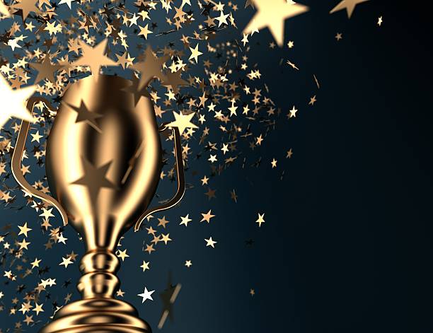 gold cup "Gold cup and falling stars,copy space Success, competition , sports, and winning concept." trophy award stock pictures, royalty-free photos & images