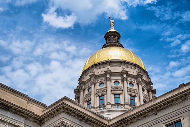 Gold dome of Georgia Capitol in Atlanta Gold dome of Georgia Capitol in Atlanta capital architectural feature stock pictures, royalty-free photos & images