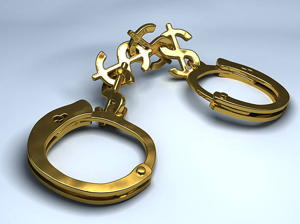 Gold Handcuffs stock photo