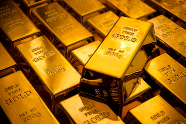 Gold ingots  gold bar stock pictures, royalty-free photos & images