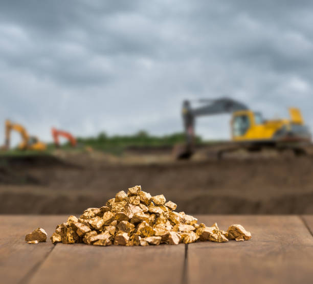 Gold nuggets from gold pit mine stock photo