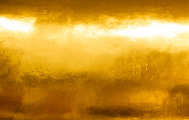 gouden glanzende muurabstran abstrale achtergrondtextuur, zalige luxe en elegant - goud metaal stockfoto's en -beelden