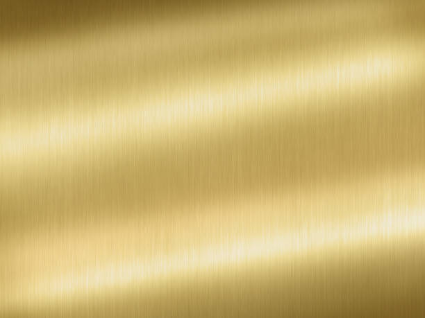 gouden texturen - goud metaal stockfoto's en -beelden