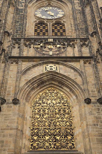 Gold window of Cathedral St. Vitus (Prague) stock photo
