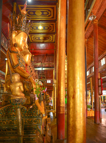 Golden Buhhda statue in Mandalay Myanmar temple