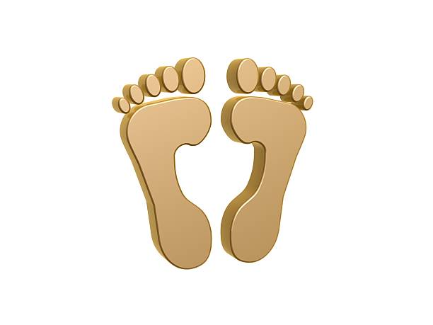 golden feet symbol stock photo