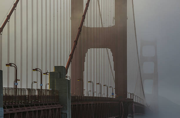 Golden Gate Bridge Fog at Sunset stock photo