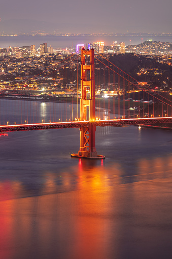 The iconic view of Golden Gate Bridge from Hawk Hill in the evening.
