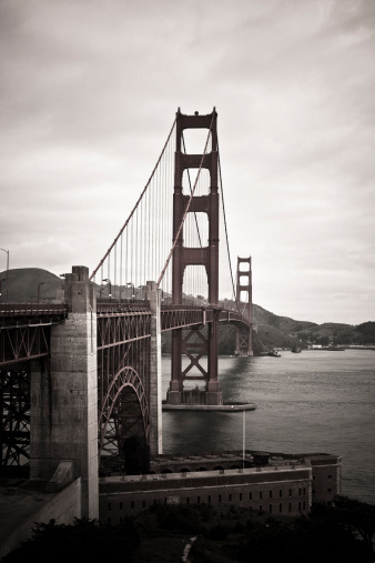 Sepia toned view of the Golden Gate Bridge. Grainy, dibital noise added.