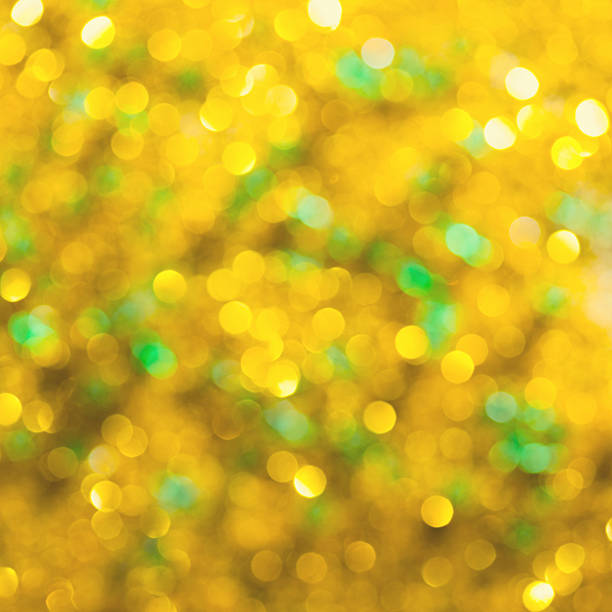 Golden - green sparkling background stock photo