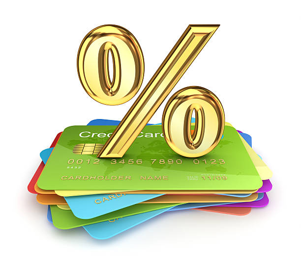 Golden percents symbol on a colorful credit cards. stock photo