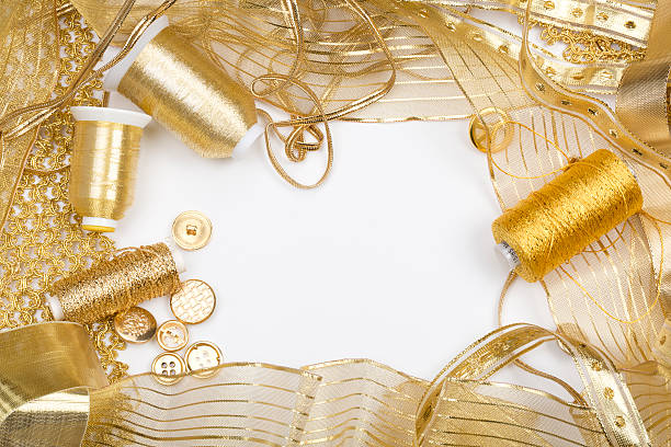 Golden sewing notions stock photo