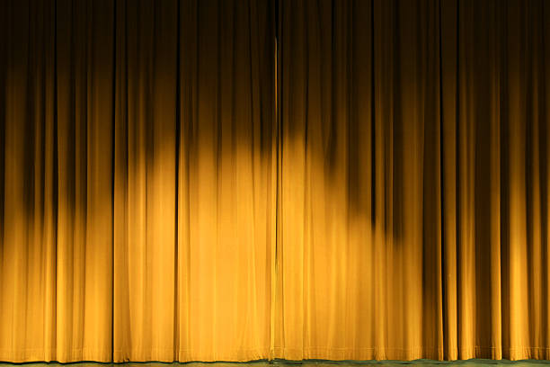 Golden stage curtains stock photo
