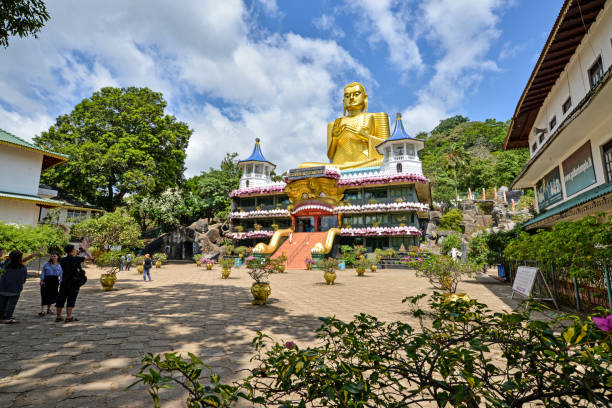 Golden Temple near the Dambulla royal cave, Dambullagama, Sri Lanka Dambullagama, Sri Lanka - July 7, 2016: General view of the entrance of the Golden Temple near the Dambulla royal cave temple dambulla stock pictures, royalty-free photos & images