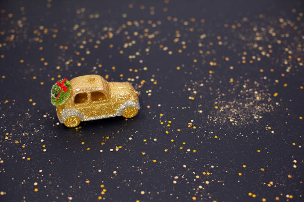 Golden toy car, Christmas or Happy New year 2021 stock photo