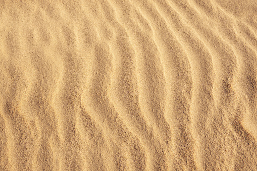 Surface of natural wavy sand