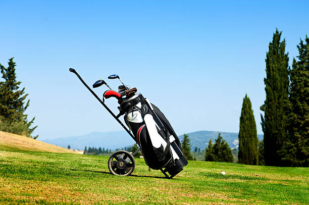 Golf bag on fairway stock photo