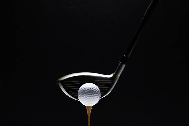 Golf Ball and Club stock photo