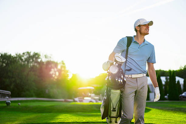 ゴルフ選手 - ゴルフ　服装 ストックフォトと画像